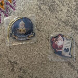 Set of 2 Unopened Notre Dame Holiday Ornaments